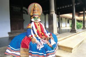 Kathakali dancer showcases an intricate and elaborate make up procedure that you should not miss this cultural performance.