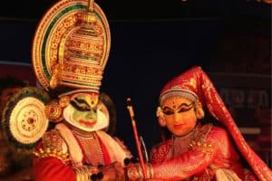 Kathakali dance is a traditional Kerala dance by expressing emotions through hand gestures, facial and eye movements, supported by traditional music, a must-see on India Travel tours.