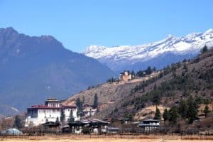 Rinpung dzong is a large fortress in Paro next to a traditional covered cantilever bridge. It has 14 shrines and chapels. Join us at our Bhutan tour.